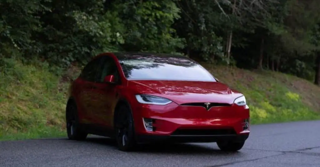 red Tesla Model X front side view